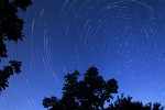 My first attempt at photographing the night sky. I shot this approximately 2.5 hour exposure near Old Idsworth in Hampshire, UK. With the little program Startrails I stacked 23 360-sec exposures. It is easy to see that the stars get fainter as time passes which was caused by dew on my lens. The remaining images were completely useless because of this. Unfortunately I didn't notice this, in the pitch dark night, until I came home. Next time I'll try sticking 1 or 2 chemical handwarmers on my lens.