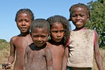 A warm welcome by some very curious kids on the banks of the Tsiribihina river, Madagascar. : Madagascar