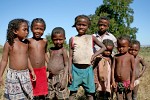 A warm welcome by some very curious kids on the banks of the Tsiribihina river, Madagascar. : Madagascar