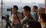 Photography frenzy at sunset. : China, People