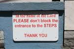 Sign at a Church entrance in St George, Grenada Island. : Grenada, Signs