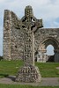 Cross of the Scriptures (replica) and west front of the Clonmacnoise Cathedral, Ireland. : Ireland