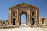 Hadrian's Arch  The triumphal, 13m-tall Hadrian's Arch at the entrance of Jerash (Gerasa in Roman times). It was built to honour the visiting emperor Hadrian. Jerash is considered one of the most important and best preserved Roman cities in the Near East. It was a city of the Decapolis, the ten cities on the eastern frontier of the Roman Empire in Judea and Syria. Recent excavations show that Jerash was already inhabited during the Bronze Age (3200 BC - 1200 BC). : Jordan