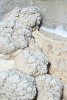 Salt deposits on the Dead Sea shoreline. : Jordan