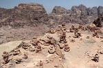 So what are these intriguing piles of stone? A Bedouin assured me that they have no significance whatsoever, it' s just tourist wanting to leave their mark. : Jordan