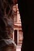 First glimpse of the Treasury  First glimpse of the iconic and probably best known structure of the ancient city of Petra: The Treasury (or locally known as Al-Khazneh). Upon exiting the 1.2km long Siq, this is the magnificent sight your presented with. The beautifully colored, Hellenistic facade is an astonishing piece of craftsmanship of a scale and grandeur guaranteed to evoke a wow. : Jordan