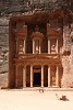 The Treasury (or locally known as Al-Khazneh) is probably the best known structure of the ancient city of Petra. It was carved out of the iron-rich sandstone rock to serve as a tomb for the Nabataean King Aretas III, probably somewhere between 100 BC and AD 200. : Jordan