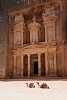 Treasury (or locally known as Al-Khazneh) is probably the best known structure of the ancient city of Petra. It was carved out of the iron-rich sandstone rock to serve as a tomb for the Nabataean King Aretas III, probably somewhere between 100 BC and AD 200. : Jordan