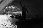 Gondola sheltering from the rain, Venice, Italy. : Italy, People