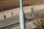 An disused highway makes for an excellent place to play soccer.