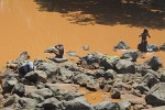 Bathing and washing in the Omo river.