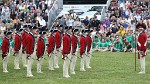 The "Twilight Tattoo" in Arlington, VA. This hour-long public performance features Soldiers from The 3rd U.S. Infantry Regiment (The Old Guard) and The U.S. Army Band "Pershing's Own". They offer a glimpse into American history through performances by The U.S. Army Blues, vocalists from The U.S. Army Band Downrange, The Old Guard Fife and Drum Corps, and The U.S. Army Drill Team.  The history of Twilight Tattoo began more than 300 years ago as British troops were summoned from the warmth and hospitality of local pubs by a bugle and drum call to return to the barracks. The familiar tune told tavern owners “doe den tap toe,” or “time to turn off the taps.” The troops knew the call to mean “taps off,” and minutes later they were back in their tents.