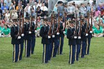 The "Twilight Tattoo" in Arlington, VA. This hour-long public performance features Soldiers from The 3rd U.S. Infantry Regiment (The Old Guard) and The U.S. Army Band "Pershing's Own". They offer a glimpse into American history through performances by The U.S. Army Blues, vocalists from The U.S. Army Band Downrange, The Old Guard Fife and Drum Corps, and The U.S. Army Drill Team.  The history of Twilight Tattoo began more than 300 years ago as British troops were summoned from the warmth and hospitality of local pubs by a bugle and drum call to return to the barracks. The familiar tune told tavern owners “doe den tap toe,” or “time to turn off the taps.” The troops knew the call to mean “taps off,” and minutes later they were back in their tents.