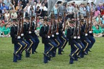 The "Twilight Tattoo" in Arlington, VA. This hour-long public performance features Soldiers from The 3rd U.S. Infantry Regiment (The Old Guard) and The U.S. Army Band "Pershing's Own". They offer a glimpse into American history through performances by The U.S. Army Blues, vocalists from The U.S. Army Band Downrange, The Old Guard Fife and Drum Corps, and The U.S. Army Drill Team.  The history of Twilight Tattoo began more than 300 years ago as British troops were summoned from the warmth and hospitality of local pubs by a bugle and drum call to return to the barracks. The familiar tune told tavern owners “doe den tap toe,” or “time to turn off the taps.” The troops knew the call to mean “taps off,” and minutes later they were back in their tents.