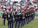 The "Twilight Tattoo" in Arlington, VA. This hour-long public performance features Soldiers from The 3rd U.S. Infantry Regiment (The Old Guard) and The U.S. Army Band "Pershing's Own". They offer a glimpse into American history through performances by The U.S. Army Blues, vocalists from The U.S. Army Band Downrange, The Old Guard Fife and Drum Corps, and The U.S. Army Drill Team.  The history of Twilight Tattoo began more than 300 years ago as British troops were summoned from the warmth and hospitality of local pubs by a bugle and drum call to return to the barracks. The familiar tune told tavern owners “doe den tap toe,” or “time to turn off the taps.” The troops knew the call to mean “taps off,” and minutes later they were back in their tents.