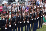 The "Twilight Tattoo" in Arlington, VA. This hour-long public performance features Soldiers from The 3rd U.S. Infantry Regiment (The Old Guard) and The U.S. Army Band "Pershing's Own". They offer a glimpse into American history through performances by The U.S. Army Blues, vocalists from The U.S. Army Band Downrange, The Old Guard Fife and Drum Corps, and The U.S. Army Drill Team.  The history of Twilight Tattoo began more than 300 years ago as British troops were summoned from the warmth and hospitality of local pubs by a bugle and drum call to return to the barracks. The familiar tune told tavern owners “doe den tap toe,” or “time to turn off the taps.” The troops knew the call to mean “taps off,” and minutes later they were back in their tents.