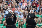 The "Twilight Tattoo" in Arlington, VA. This hour-long public performance features Soldiers from The 3rd U.S. Infantry Regiment (The Old Guard) and The U.S. Army Band "Pershing's Own". They offer a glimpse into American history through performances by The U.S. Army Blues, vocalists from The U.S. Army Band Downrange, The Old Guard Fife and Drum Corps, and The U.S. Army Drill Team.  The history of Twilight Tattoo began more than 300 years ago as British troops were summoned from the warmth and hospitality of local pubs by a bugle and drum call to return to the barracks. The familiar tune told tavern owners “doe den tap toe,” or “time to turn off the taps.” The troops knew the call to mean “taps off,” and minutes later they were back in their tents.