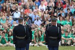 The "Twilight Tattoo" in Arlington, VA. This hour-long public performance features Soldiers from The 3rd U.S. Infantry Regiment (The Old Guard) and The U.S. Army Band "Pershing's Own". They offer a glimpse into American history through performances by The U.S. Army Blues, vocalists from The U.S. Army Band Downrange, The Old Guard Fife and Drum Corps, and The U.S. Army Drill Team.  The history of Twilight Tattoo began more than 300 years ago as British troops were summoned from the warmth and hospitality of local pubs by a bugle and drum call to return to the barracks. The familiar tune told tavern owners “doe den tap toe,” or “time to turn off the taps.” The troops knew the call to mean “taps off,” and minutes later they were back in their tents.