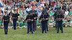 The "Twilight Tattoo" in Arlington, VA. This hour-long public performance features Soldiers from The 3rd U.S. Infantry Regiment (The Old Guard) and The U.S. Army Band "Pershing's Own". They offer a glimpse into American history through performances by The U.S. Army Blues, vocalists from The U.S. Army Band Downrange, The Old Guard Fife and Drum Corps, and The U.S. Army Drill Team.  The history of Twilight Tattoo began more than 300 years ago as British troops were summoned from the warmth and hospitality of local pubs by a bugle and drum call to return to the barracks. The familiar tune told tavern owners “doe den tap toe,” or “time to turn off the taps.” The troops knew the call to mean “taps off,” and minutes later they were back in their tents.