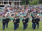 The "Twilight Tattoo" in Arlington, VA. This hour-long public performance features Soldiers from The 3rd U.S. Infantry Regiment (The Old Guard) and The U.S. Army Band "Pershing's Own". They offer a glimpse into American history through performances by The U.S. Army Blues, vocalists from The U.S. Army Band Downrange, The Old Guard Fife and Drum Corps, and The U.S. Army Drill Team.  The history of Twilight Tattoo began more than 300 years ago as British troops were summoned from the warmth and hospitality of local pubs by a bugle and drum call to return to the barracks. The familiar tune told tavern owners “doe den tap toe,” or “time to turn off the taps.” The troops knew the call to mean “taps off,” and minutes later they were back in their tents.