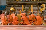 Buddhist monks praying near Bayon - Angkor Thom, Cambodia. : Cambodia