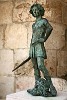 Statue of David at the Citadel - Old City Jerusalem, Israel. The municipality of Florence offered a copy of Michelangelo's David as a present to Jerusalem marking the 3000-year anniversary of the city (in 1995). The municipality of Jerusalem, however, refused the present because it was too sexually explicit. The city council of Jerusalem feared that the naked shepherd boy would offend Jerusalem's ultra-Orthodox and Arab communities. Instead, the city accepted a replica of a bronze David by Michelangelo's Florentine contemporary, Andrea del Verrocchio - less famous, but with the distinct advantage of being clothed. The white marble Michelangelo depicts the young David, slingshot over his shoulder, after slaying Goliath. : Israel, SNMG2 Deployment 2006