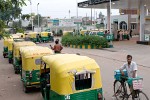 Motor-rickshaws waiting for refuelling - Agra, India. : India