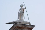 Statue of St Theodore, the original patron saint of Venice, crowning one of the two columns on Piazzetta San Marco. : Italy