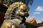 Bronze lion guarding the inner palace of the forbidden city. : China