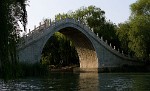 One of the numerous beautiful bridges in the Imperial Summer Palace Northwest of Beijing. : China