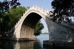 One of the numerous beautiful bridges in the Imperial Summer Palace Northwest of Beijing. : China