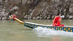 Paddling a dragon boat up the Jiu Wan stream. : China, People