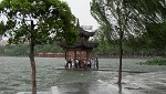 Tropical thunderstorm shortly after the total solar eclipse, West Lake, Hángzhou. : China