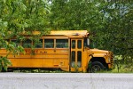 Deserted schoolbus in Copán. : Honduras