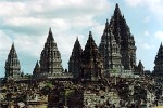 Prambanan - Central Java, Indonesia. Prambanan is the largest Hindu temple compound in Indonesia, located in Central Java, approximately 18 km east of Yogyakarta. It was built around 850 CE by either Rakai Pikatan, king of the second Mataram dynasty, or Balitung Maha Sambu, during the Sanjaya Dynasty. Not long after its construction, the temple was abandoned and began to deteriorate. Reconstruction of the compound began in 1918. The main building was completed in around 1953. Much of the original stonework, which has often been stolen and reused at remote construction sites. A temple will only be rebuilt if at least 75% of the original stones are available, and therefore only the foundation walls of most of the smaller shrines are now visible and with no plans for reconstruction. Today, the temple is a UNESCO World Heritage Site and is one of the largest Hindu temples in south-east Asia. It is characterised by its tall and pointed architecture, typical of Hindu temple architecture, and by the 47m high central building inside a large complex of individual temples.