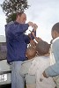 Handing out remaining candy - Kilimanjaro, Tanzania.