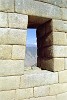 Accurately carved stone blocks lock together in mortarless walls. This is a perfect example of the famous and characteristic Inca architecture - Machu Picchu, Peru.