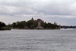 Boldt Castle on Heart Island (NY) Boldt Castle is located on Heart Island among the Thousand Islands of the St. Lawrence River on the northern border of New York State. Multi-millionaire George C. Boldt, proprietor of the Waldorf-Astoria Hotel in New York City and his family enjoyed for several summers an earlier frame cottage on Hart Island (the original name) which they greatly expanded. In 1900 George Boldt started the construction of a huge masonry structure, one of the largest private homes in America. He did this for his wife, Louise, as a testimony of the unsurpassed love of a man for his wife. The construction of Boldt Castle ceased abruptly in early 1904 after the death of Boldt's wife, Louise Kehrer Boldt. For 73 years, the castle and other stone structures were left exposed to the harsh winter weather and occasional vandals. The Thousand Islands Bridge Authority acquired Heart Island and the nearby yacht house in 1977, for one dollar, under the agreement that all revenues obtained from the castle operation would be applied towards restoration, so that the island would be preserved for the enjoyment of future generations. In the two decades after acquiring the property, the Thousand Islands Bridge Authority spent some fifteen million dollars for restoration and improvements here, and work continues annually. The initial goal of the restoration of Heart Island was not to finish what hadn't been completed, but to restore the island to the state it was in when construction was halted.