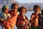 Kids show interest in our campsite on the banks of the Tsiribihina river, Madagascar. : Madagascar